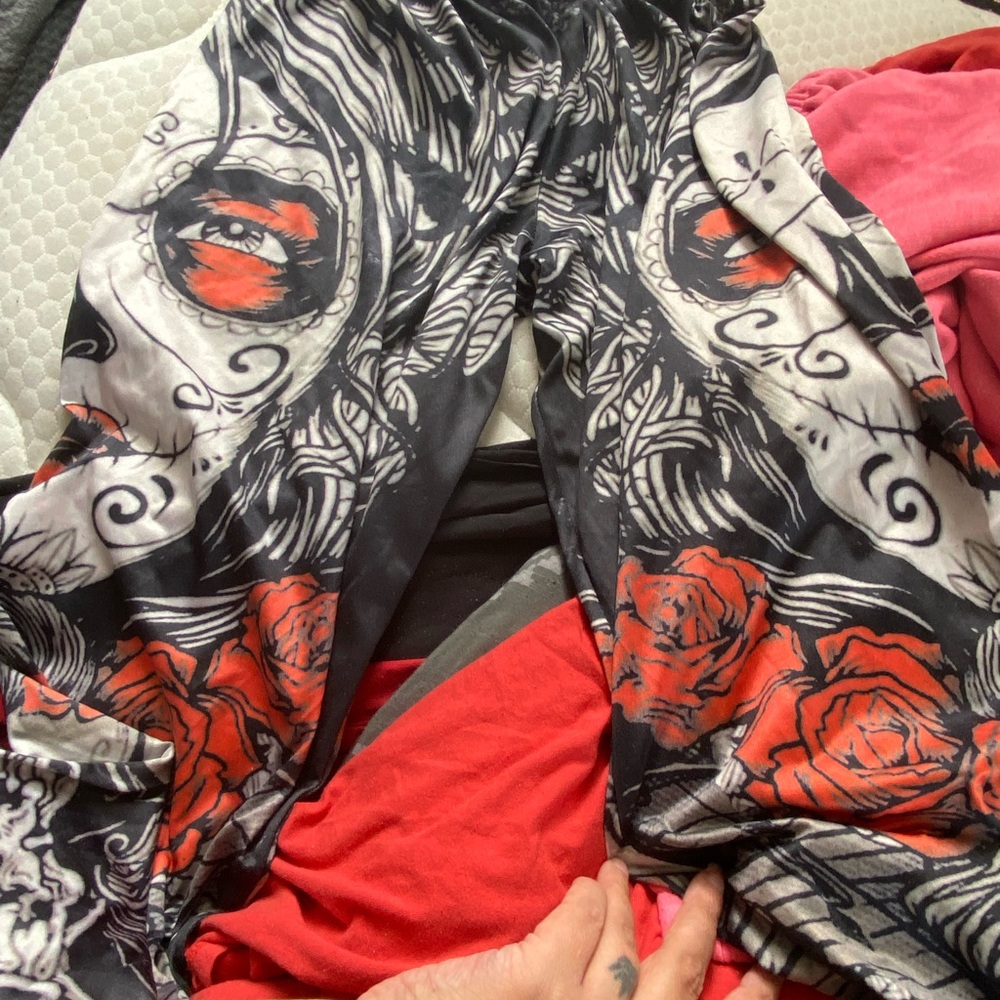 Tights silky woman’s face a roses printed on them